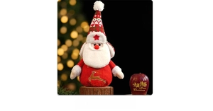 Detail of Santa Claus gift bag in red knit with reindeer embroidery and gold accents