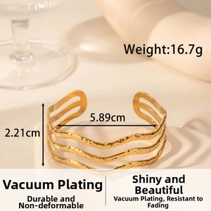 Detail showing the dimensions and weight of the gold wave textured cuff bracelet