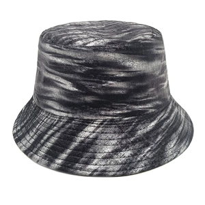 Detailed macro view of the silver and black marble texture on a canvas bucket hat