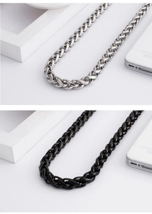 Detail of 8mm dragon bone chain necklaces in polished silver and black titanium steel