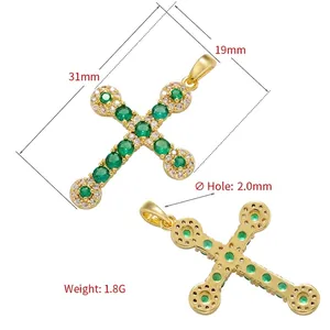 Gold plated cross necklace with green emeralds and white cubic zirconia accents