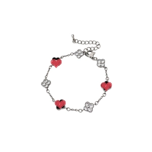Vintage style bracelet with red heart charms and zircon clover pendants in silver finish