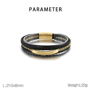Close-up of multilayer braided black leather bracelet with gold magnetic metal clasp