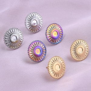 Detailed macro view of 304 stainless steel stud earrings in silver, gold, and rainbow finish