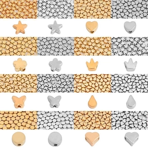 Detailed grid of gold and silver plated star and heart spacer beads for DIY jewelry making