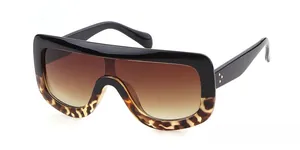 Detail of pilot sunglasses showing tortoiseshell frames and three-point metal rivets