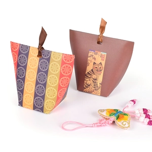 Colorful Korean-style folding gift boxes with traditional patterns and butterfly charms
