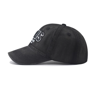 Close-up of the detailed Paris 3D embroidery on this black cotton baseball cap