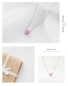 Detalle de colgantes de corazón en circonita rosa con acabados en oro y plata
