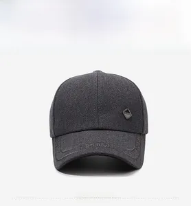 Detailed front view of dark gray baseball cap with herringbone texture and fashion logo
