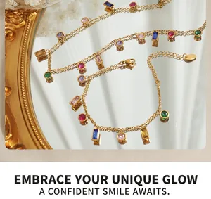 Detail of gold double-chain bracelet with multi-color zircon stones and 925 metal tag