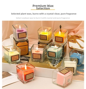 Close-up of colorful square glass scented candles made from natural plant soybean wax