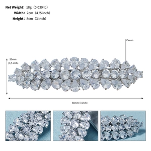 Detail showing high-quality zircon inlay and 8cm spring clip mechanism for bun hair