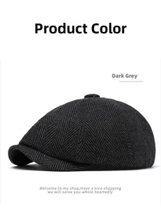 Detail view of dark grey herringbone newsboy cap showing tweed texture and top button