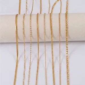 Various 18K gold plated stainless steel chain necklaces displayed on a white stand