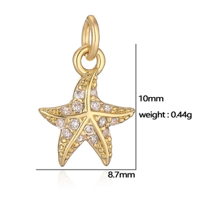 Golden starfish pendant with small clear crystals and precise size dimensions in millimeters