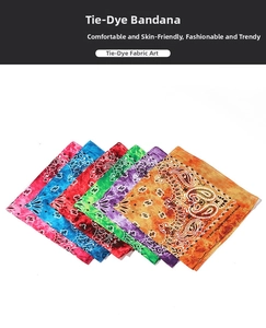 Macro detail of six colorful cotton paisley bandanas with vibrant tie-dye patterns and stitching