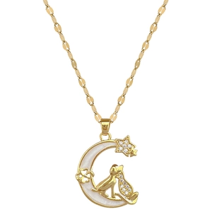 Gold moon necklace featuring cat and dog charms with sparkling zircon stars and moon inlay