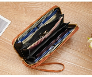 Internal view of a brown woven wallet showing card slots and spacious compartments