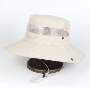 Detail of beige outdoor sun hat showing breathable mesh band and windproof cord