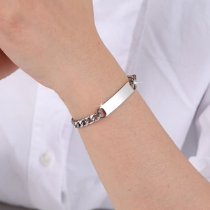 Polished stainless steel chain bracelet featuring a smooth rectangular blank ID plate tag