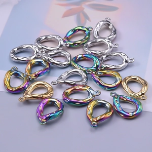 Detailed view of 304 stainless steel water drop pendants in gold silver and rainbow