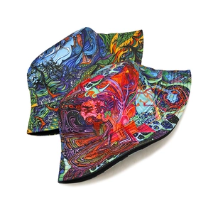 Double-sided reversible bucket hat featuring vibrant psychedelic graffiti print patterns