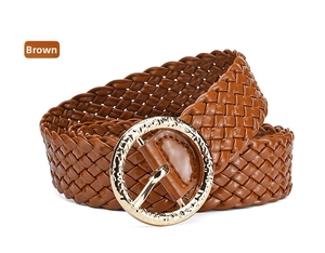 Detailed view of brown woven PU leather belt with decorative round golden buckle