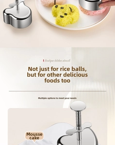 Macro detail of heart shaped stainless steel food mold with spring press handle