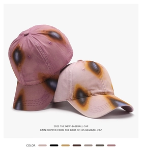 Detail of washed color-block baseball caps showing vintage texture and color options