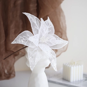 Elegant 26cm white tulle poinsettia with silver glitter in a decorative vase for Xmas decor