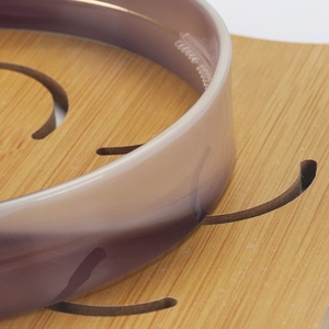 Macro detail of 2.2cm wide tortoiseshell acetate headband showing smooth resin texture