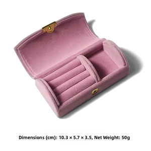 Pink velvet travel jewelry box with ring slots and snap closure, 10.3x5.7x3.5cm
