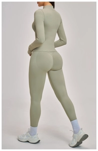Detail of sage green yoga set showing high-waist peach contour leggings from the back