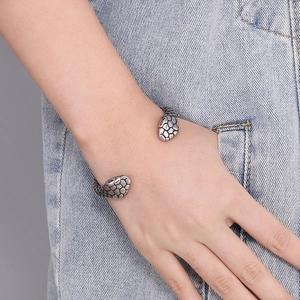 Retro punk double snake head open bangle in silver stainless steel worn on wrist
