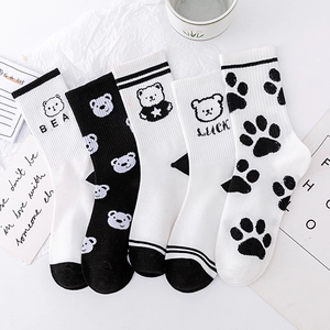 Set of 5 black and white cotton mid-calf socks with cartoon bear and star patterns