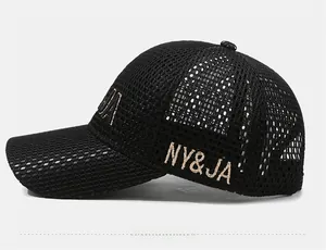 Detail of black mesh baseball cap with NY&JA embroidery and breathable texture
