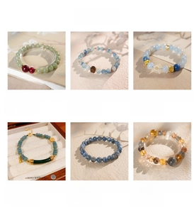 Collection of beaded gemstone bracelets featuring nephrite jade and sterling silver