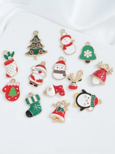 Macro shot of assorted Christmas enamel charms including Santa, Reindeer and trees for DIY