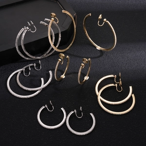 Set of five gold and silver rhinestone clip-on hoop earrings in various sizes