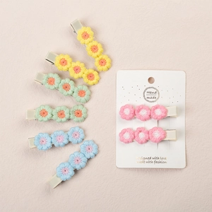 Cute handmade crochet floral hair clips set in yellow green blue and pink colors