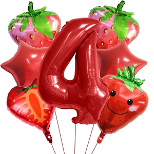 Macro detail of red strawberry balloons and number 4 foil balloon for 4th birthday party