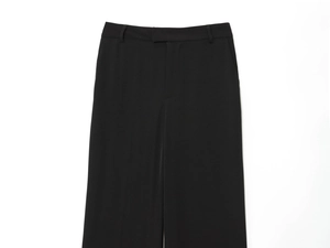 Detailed flat lay of black straight-leg casual trousers with high-quality fabric texture