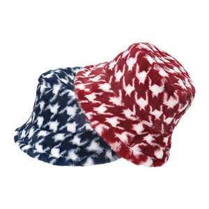 Close-up of navy and wine red houndstooth plush bucket hats with fuzzy texture