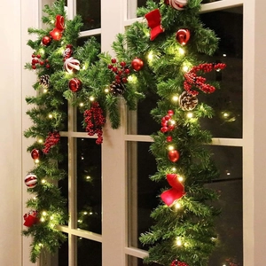Lighted 2.7m Christmas garland with red berries, pine cones and warm LED lights