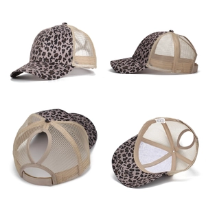 Women's leopard print ponytail trucker hat with breathable mesh and adjustable back
