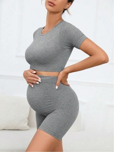 Seamless grey maternity yoga set with short sleeves and high-waisted support shorts