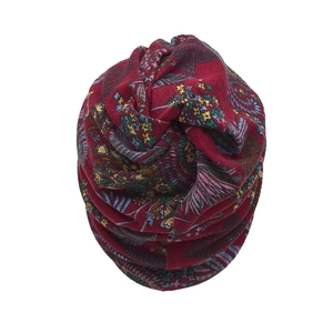 Detailed view of the bohemian floral pattern on this multifunctional neck gaiter hat
