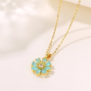 Elegant gold chain necklace with light blue sunflower pendant and zircon centerpiece