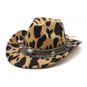 Vintage western cowboy hat with cow print pattern and turquoise ethnic beads